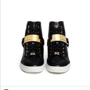 Michael Kors Helen black sneakers with a gold plate